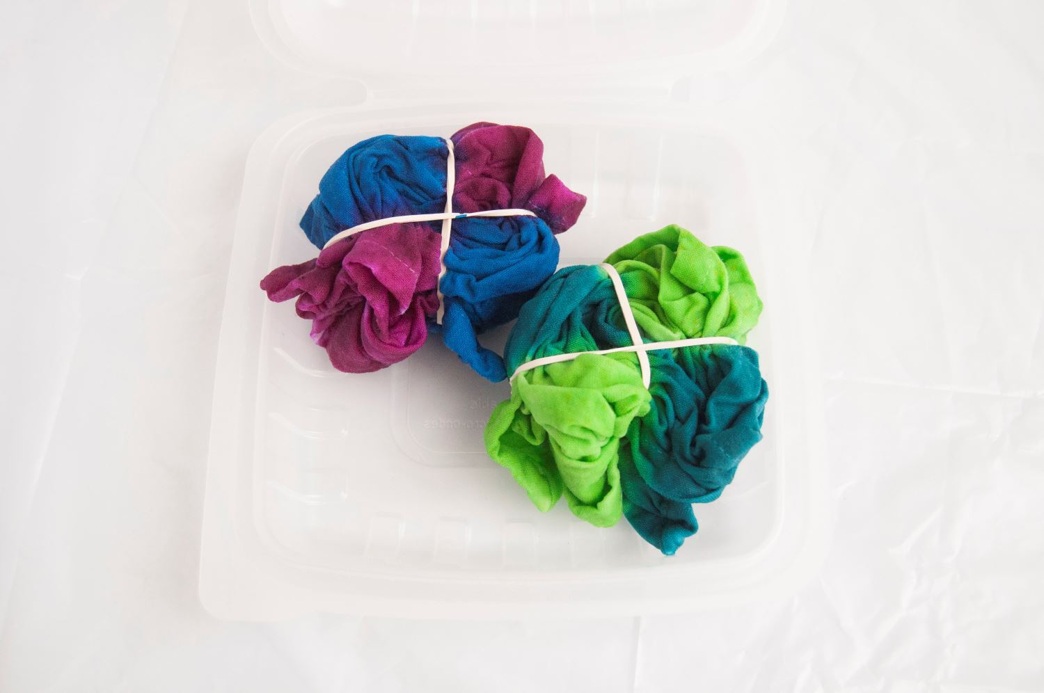 Place dyed fabric into Two-Minute Tie Dye Container