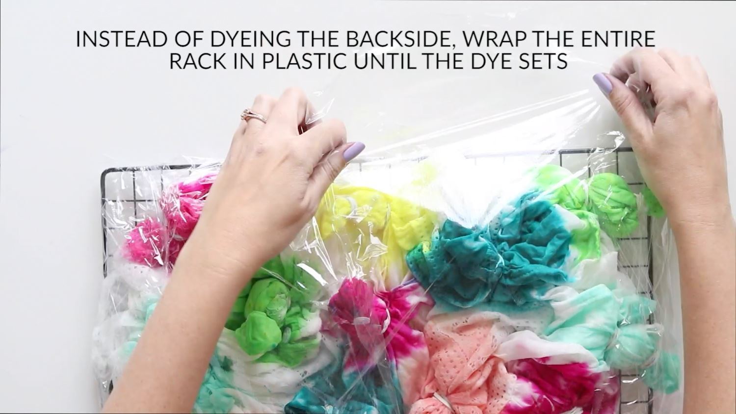 Wrap dyed kimono in plastic while dye sets