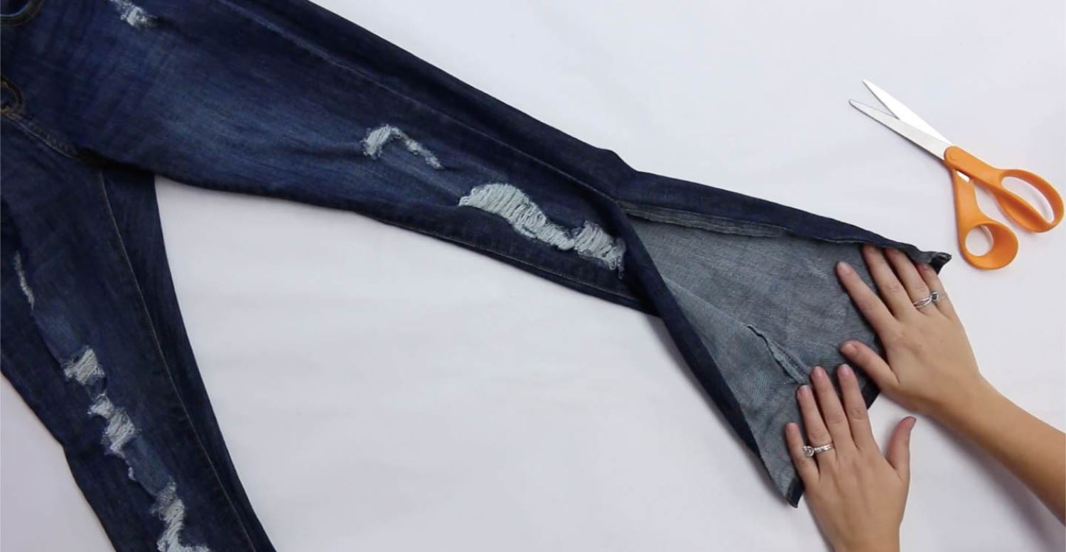 Cut jeans at side seam