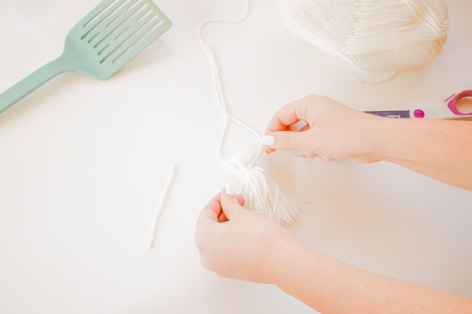 Tie string around top to create tassel